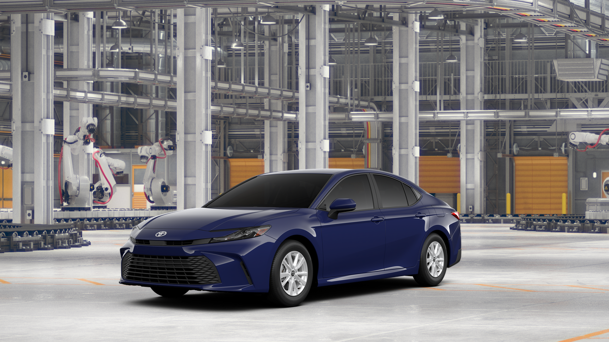 2026 Toyota Camry LE in Reservoir Blue — front three-quarter view