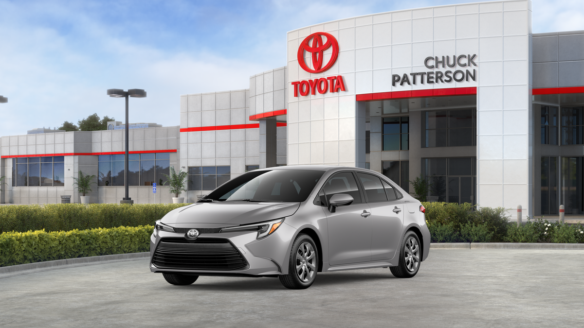 2026 Toyota Corolla Hybrid Hybrid LE in Classic Silver Metallic — front three-quarter view