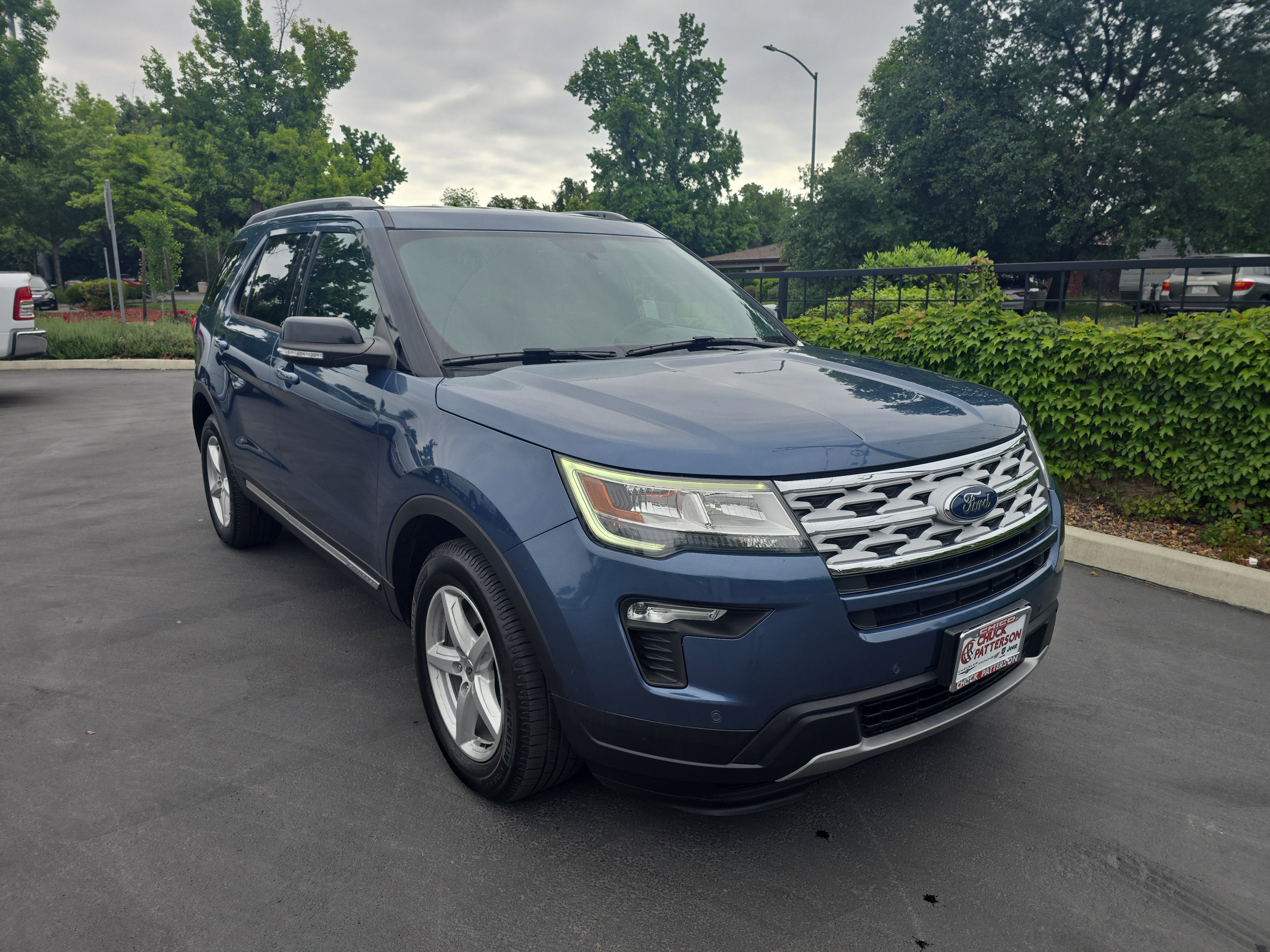 2018 Ford Explorer XLT in Blue Metallic — front three-quarter view