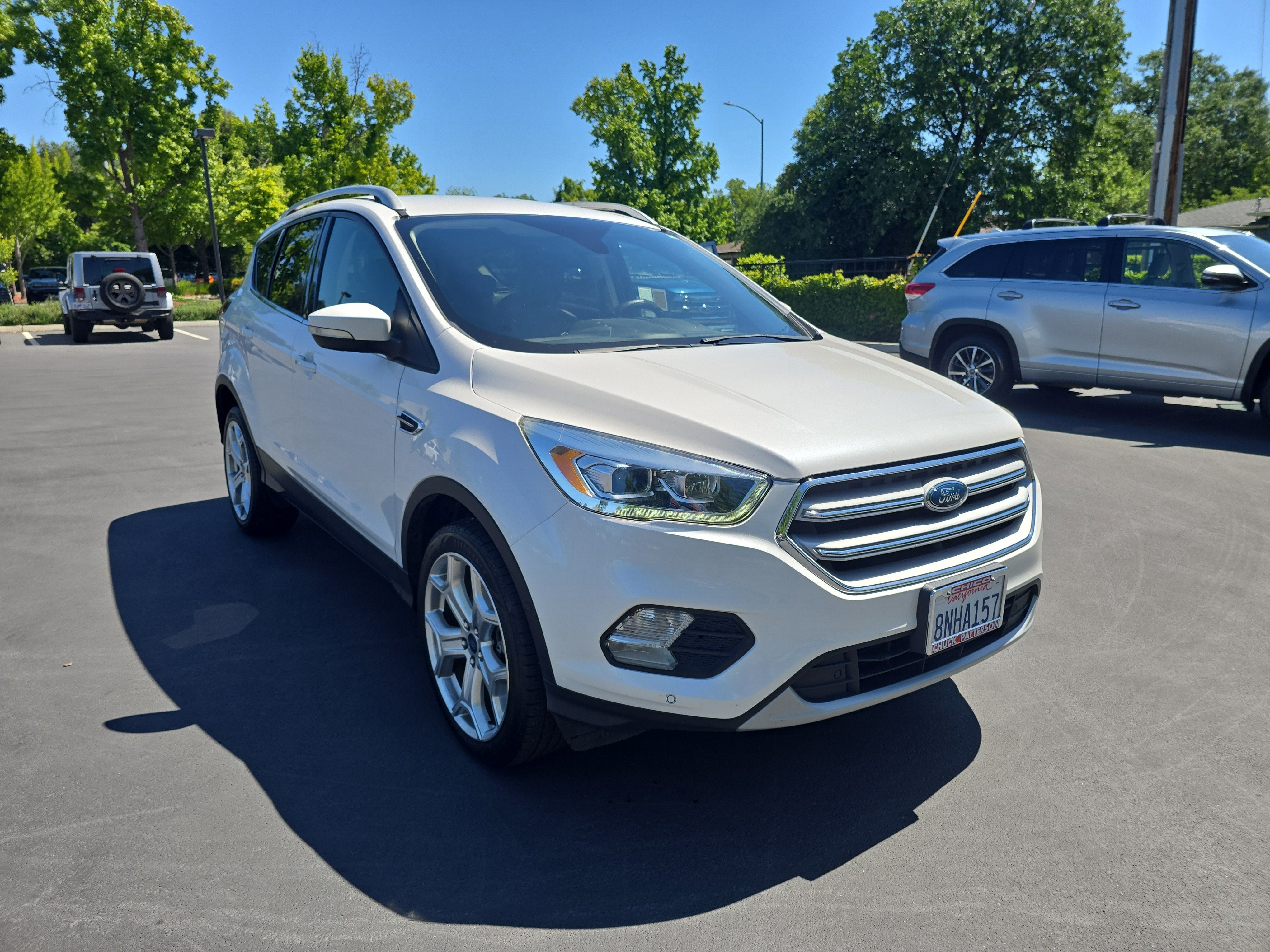 2019 Ford Escape Titanium in White Platinum Metallic Tri-Coat — front three-quarter view