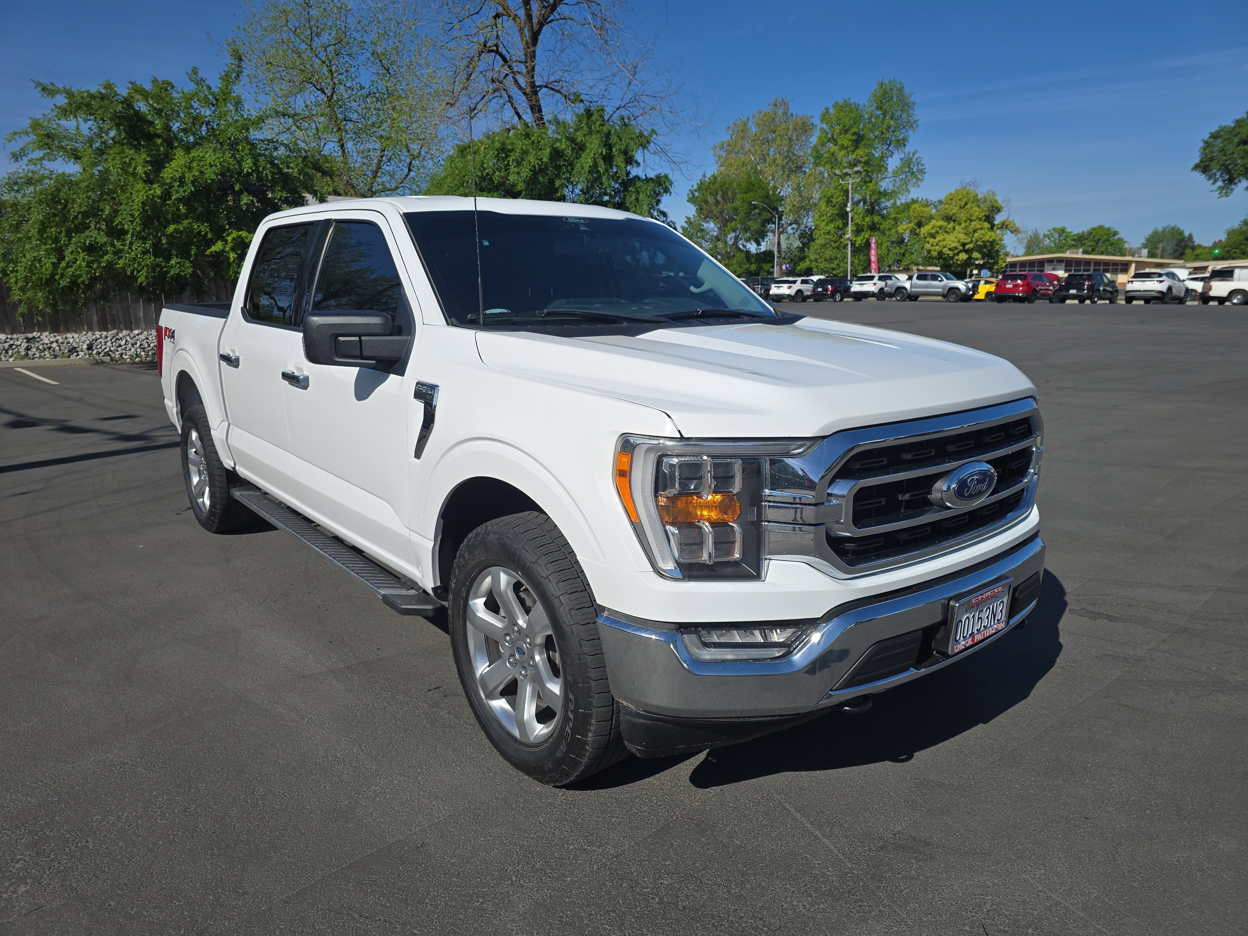 2022 Ford F-150 XLT in Oxford White — front three-quarter view