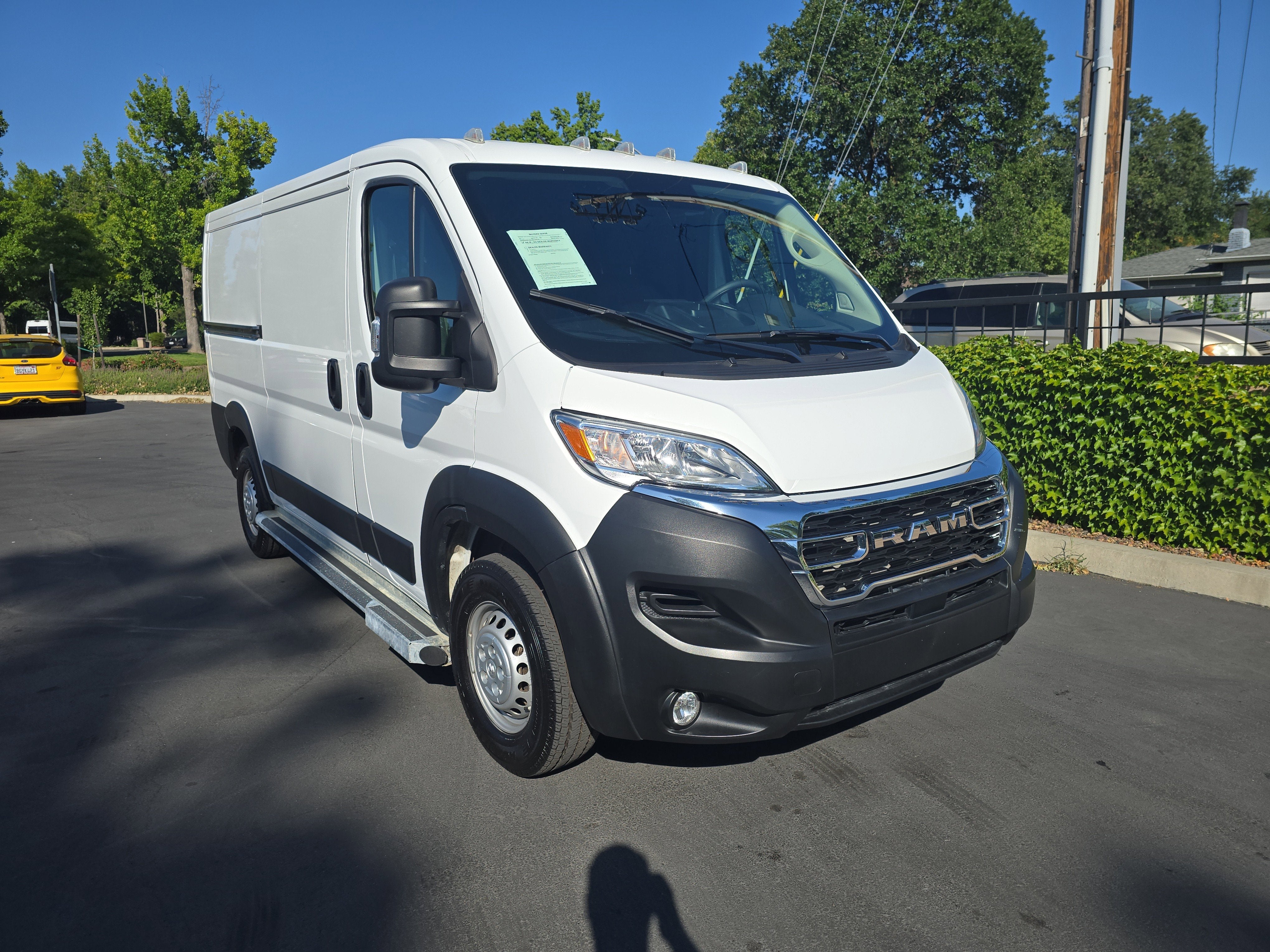 2025 RAM ProMaster Cargo Van Tradesman in Bright White Clearcoat — front three-quarter view