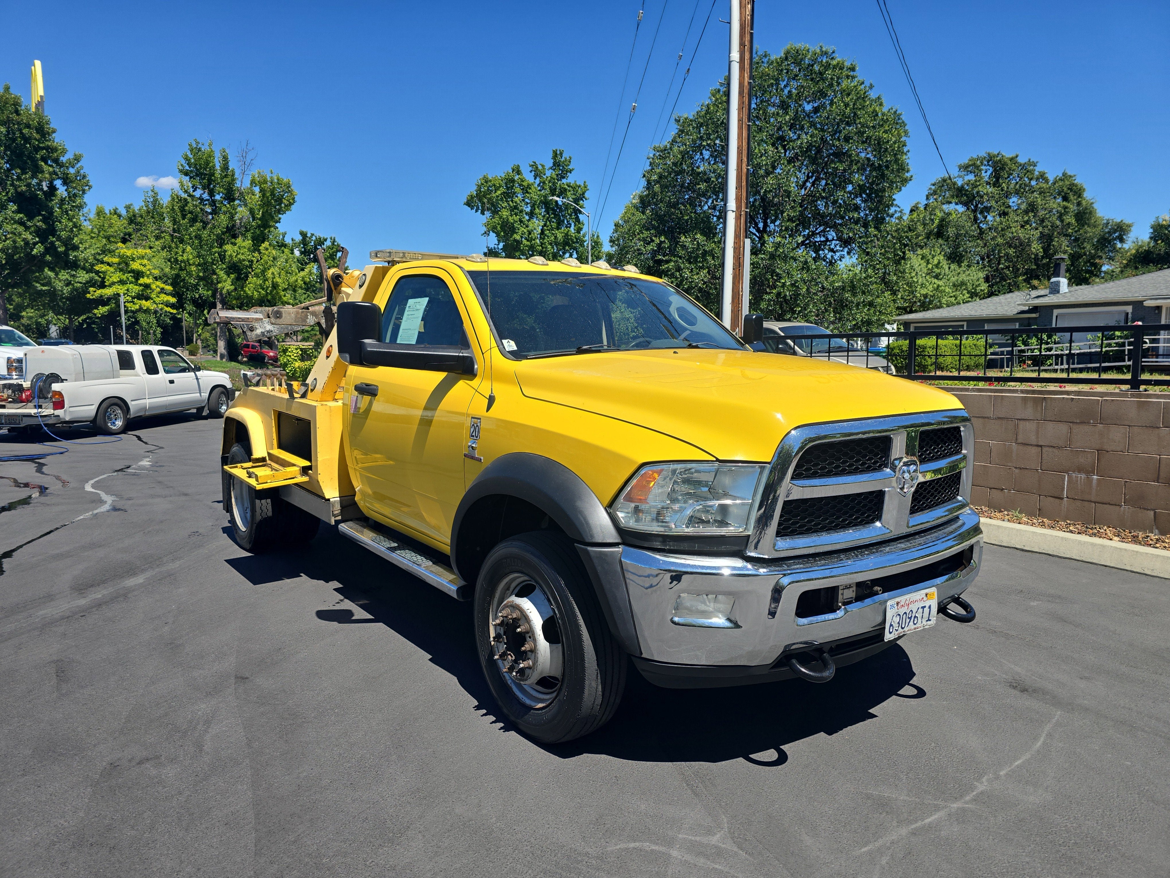2015 RAM 5500 SLT in Yellow — front three-quarter view