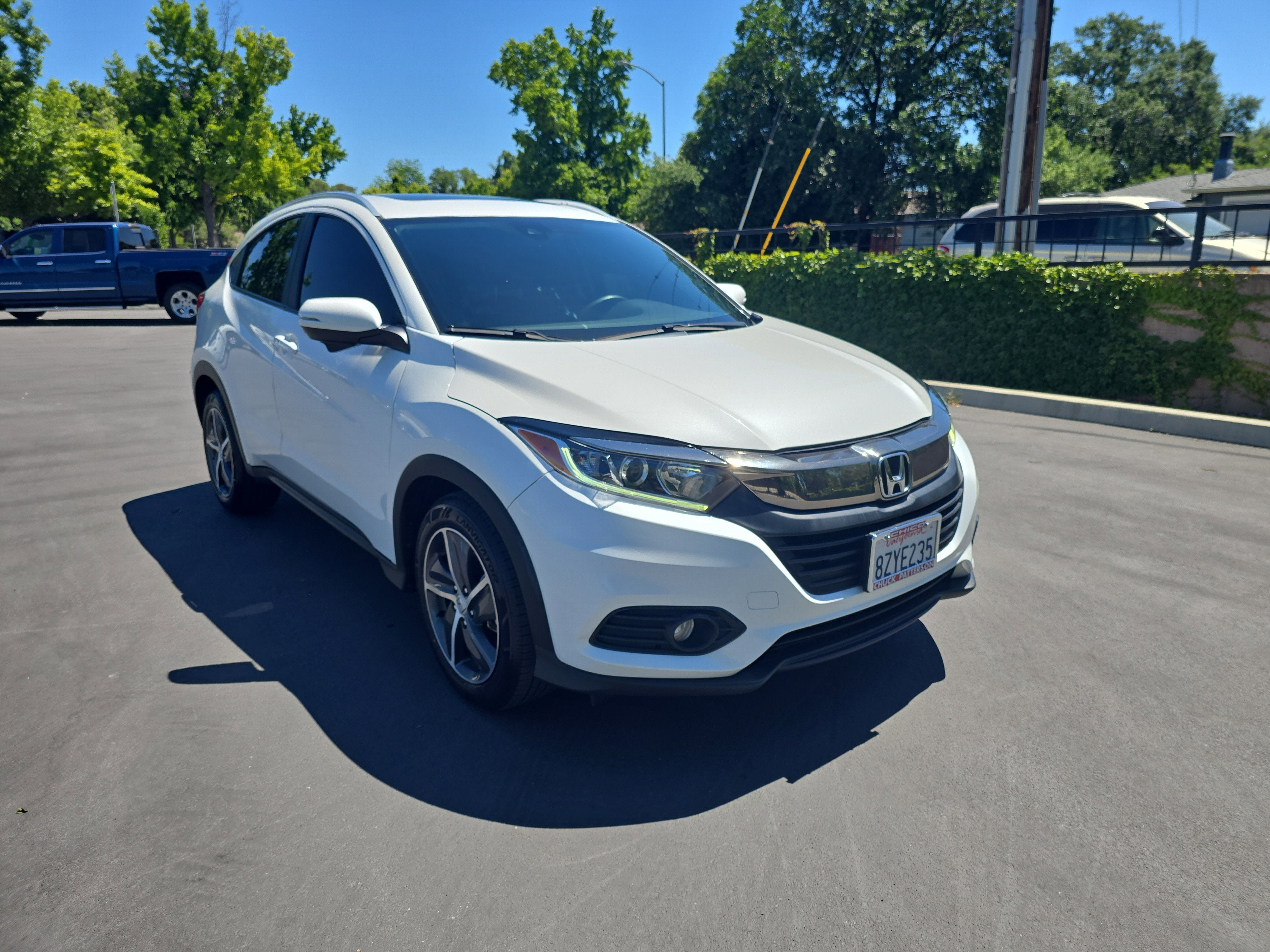 2022 Honda HR-V EX-L in Platinum White Pearl — front three-quarter view