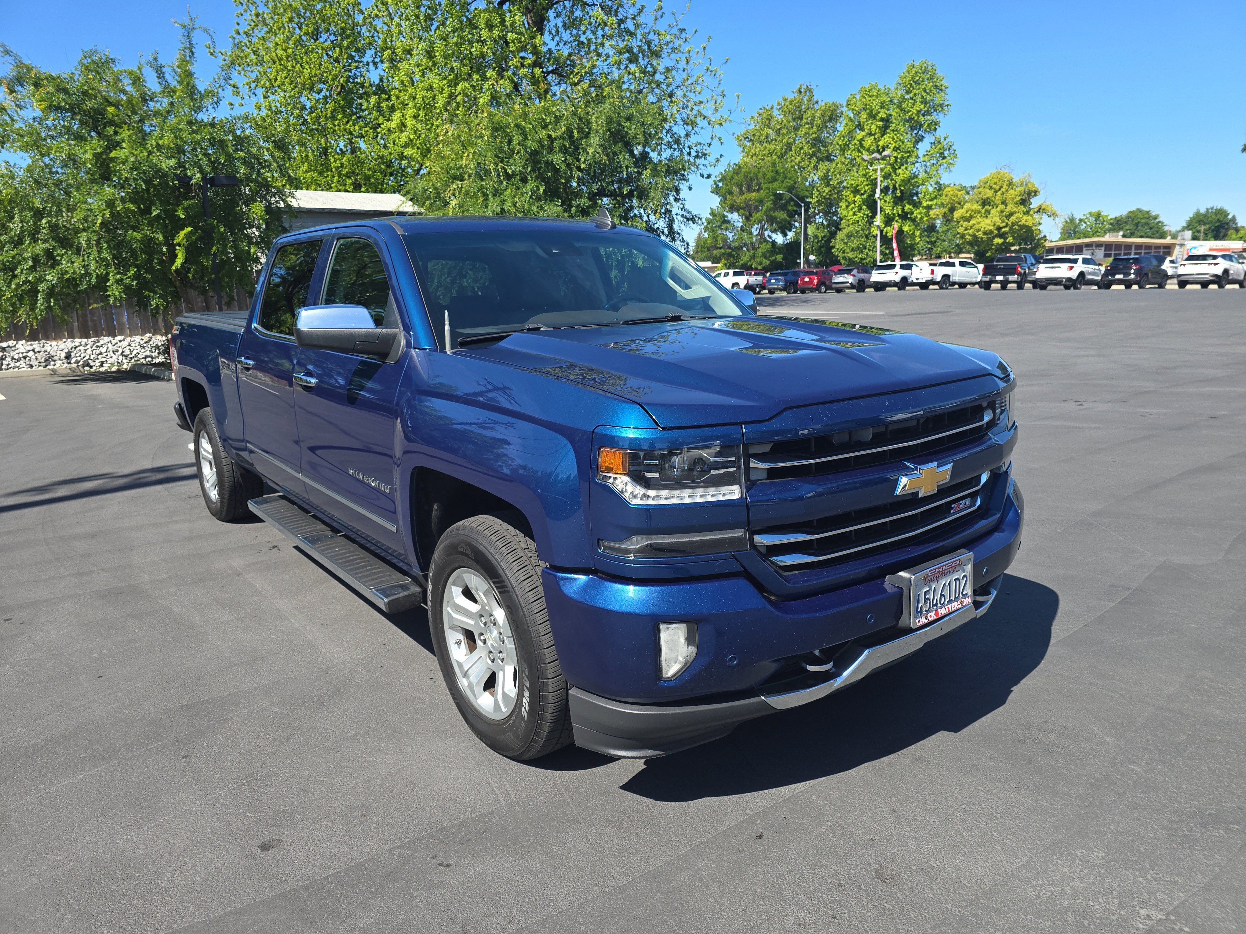 2017 Chevrolet Silverado 1500 LTZ in Deep Ocean Blue Metallic — front three-quarter view